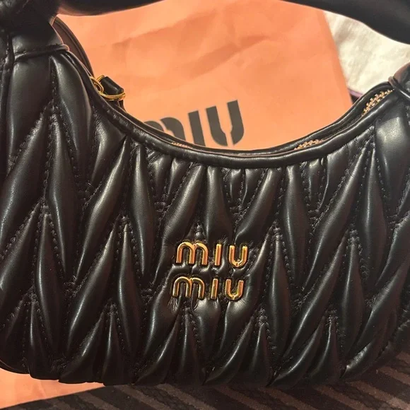 Black Quilted Shoulder Bag with Gold Details - Picture 2 of 5